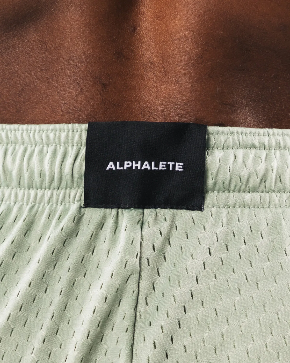 Alphalete Wolf Head Mesh Short 6" - Sage