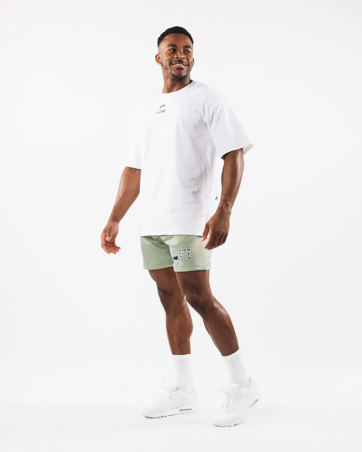 Alphalete Wolf Head Mesh Short 6" - Sage
