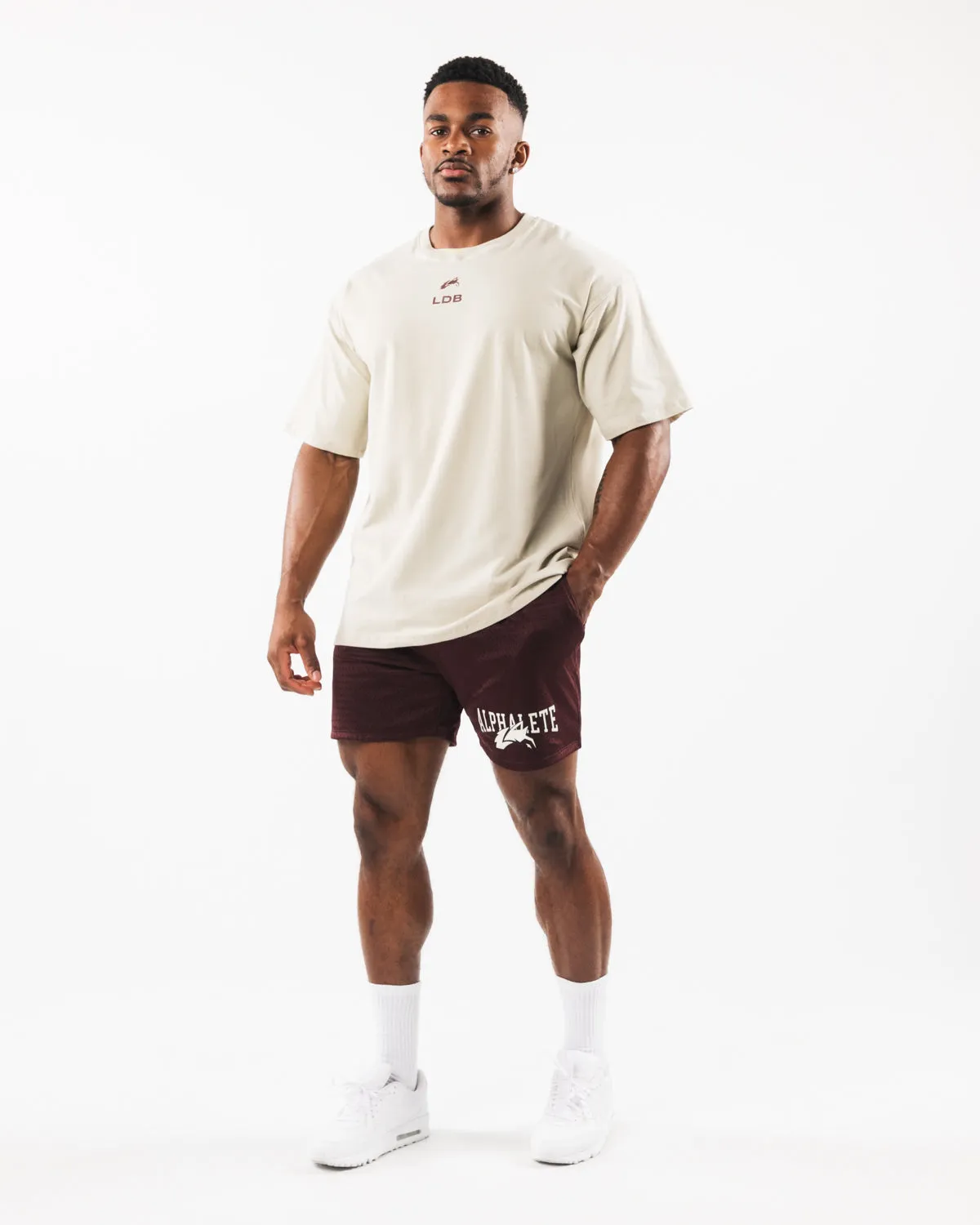Alphalete Wolf Head Mesh Short 6" - Sangria